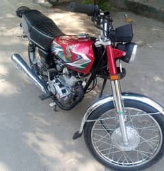 honda125 modified half red half side black wraped golden nmbr