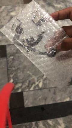 I PJONE X FRONT CAMERA CHARGING STRIP OR SPEAKER