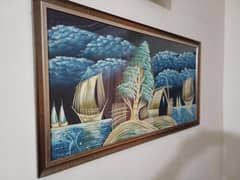 wall hanged mirror and painting