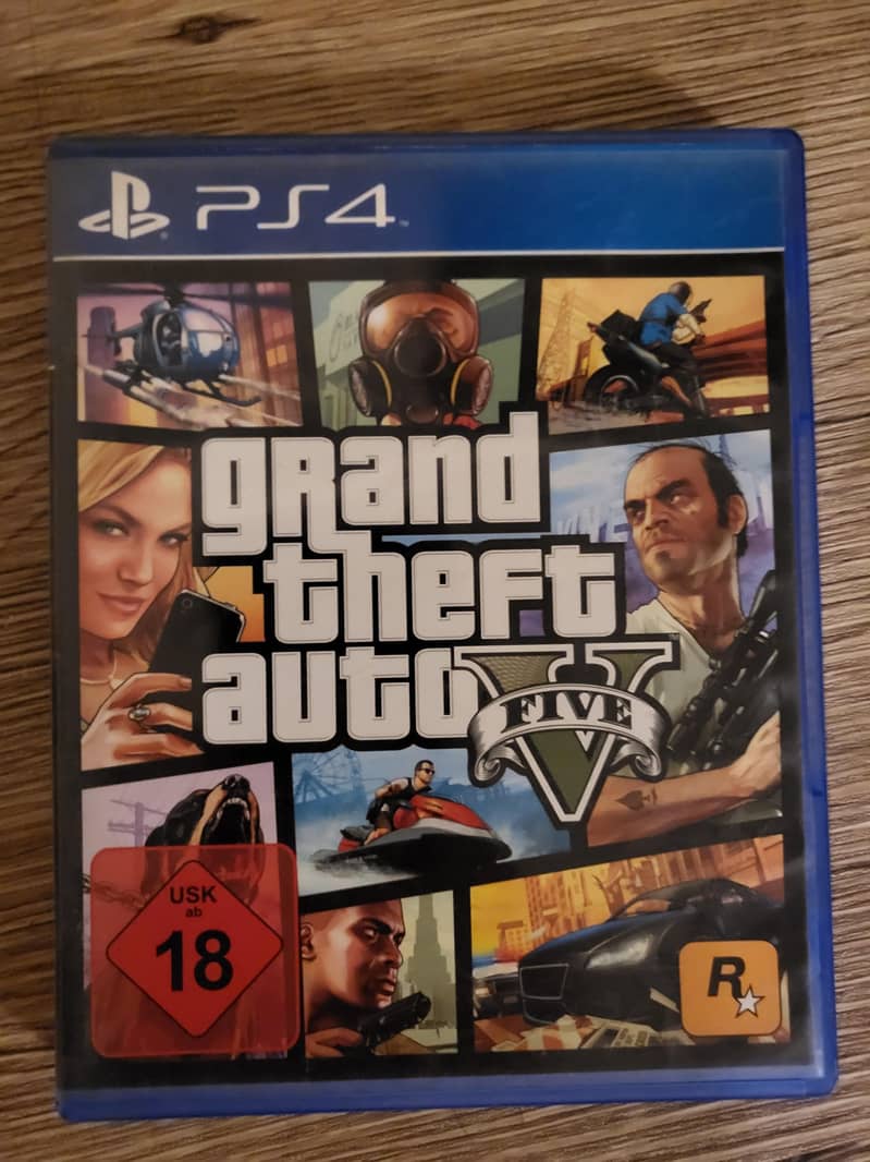 PLAYSTATION 4 SLIM 1TB with box & 3 controller.  GTA V, FIFA,ASSIN 3