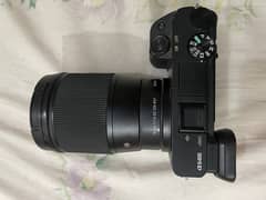 Sony a6400 with Sigma 16mm lens and 2 batteries. Excellent condition.