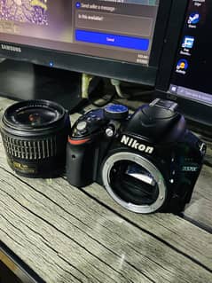 Nikkon D3200 DSLR | 55mm Kit lens | Battery Charger Box
