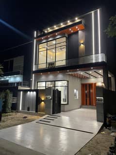 5 MARLA HOUSE ON 50 FEET WIDE ROAD IS AVAILABLE FOR SALE IN DHA PHASE 11 RAHBAR SECTOR 2