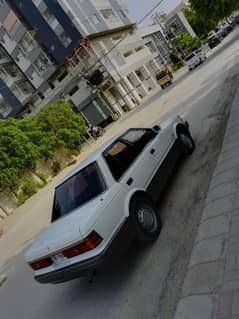 Nissan 86 bluebird London modle location korangi 03101188962