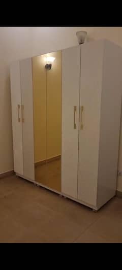 slightly used white and golden modern Cupboard