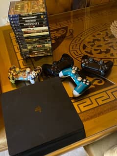Ps4 slim with 17 Discs and 4 Controllers
