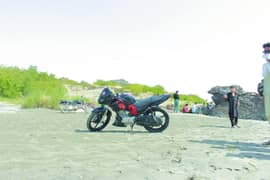YBR125