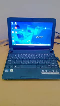 Acer Emachines laptop with charger and cable
