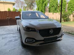 MG