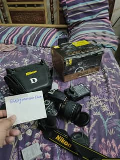Nikon D3400 with original box and 18-55 VR 2 kit lense with camera bag