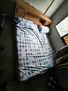 Wooden double bed Normal sized
