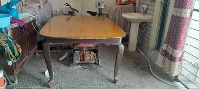 wooden dinning table with rounded corner