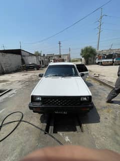 charade 1984 1000cc  lahore number