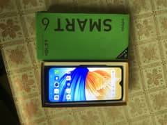 Infinix smart 6 with box charger
