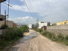 Corner 9.25 Marla Plot for Sale on Abbasi Road 300m from Bazaar, Prime Location