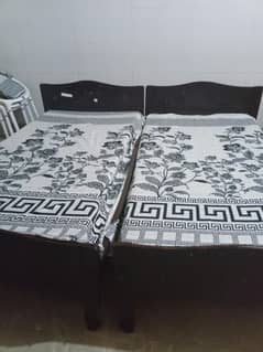 wooden bed .