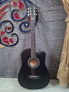 black acoustic guitar