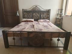 iron bed and dressing table