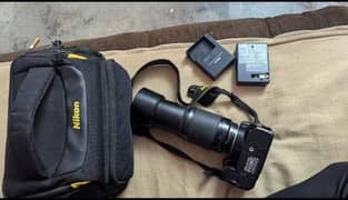 Nikon D3100 +beg+Lens 70 300+battery+ charger