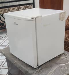 Mini refrigerator single door. (with a small freezer too) for sale.