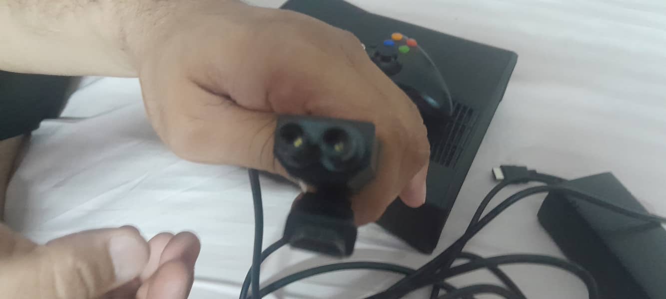 Xbox 360 with one wireless controller. New Condition less than  month 7