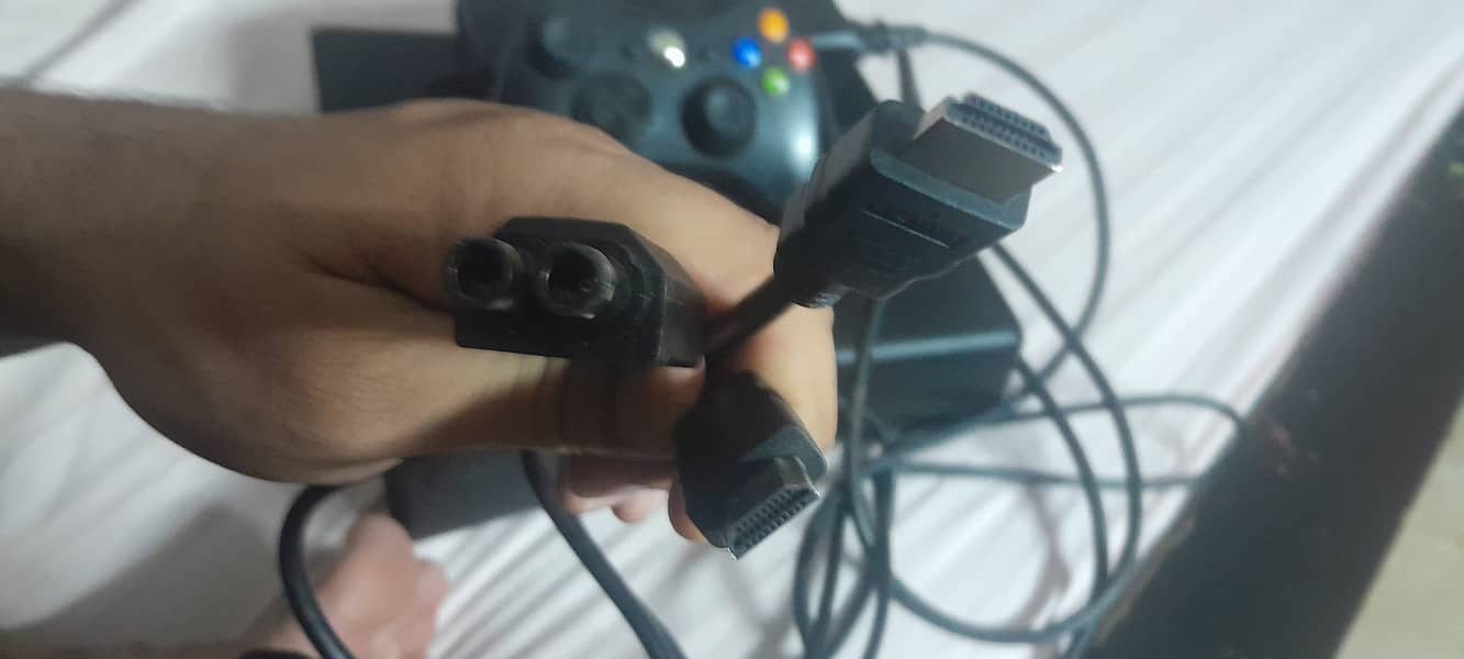 Xbox 360 with one wireless controller. New Condition less than  month 5