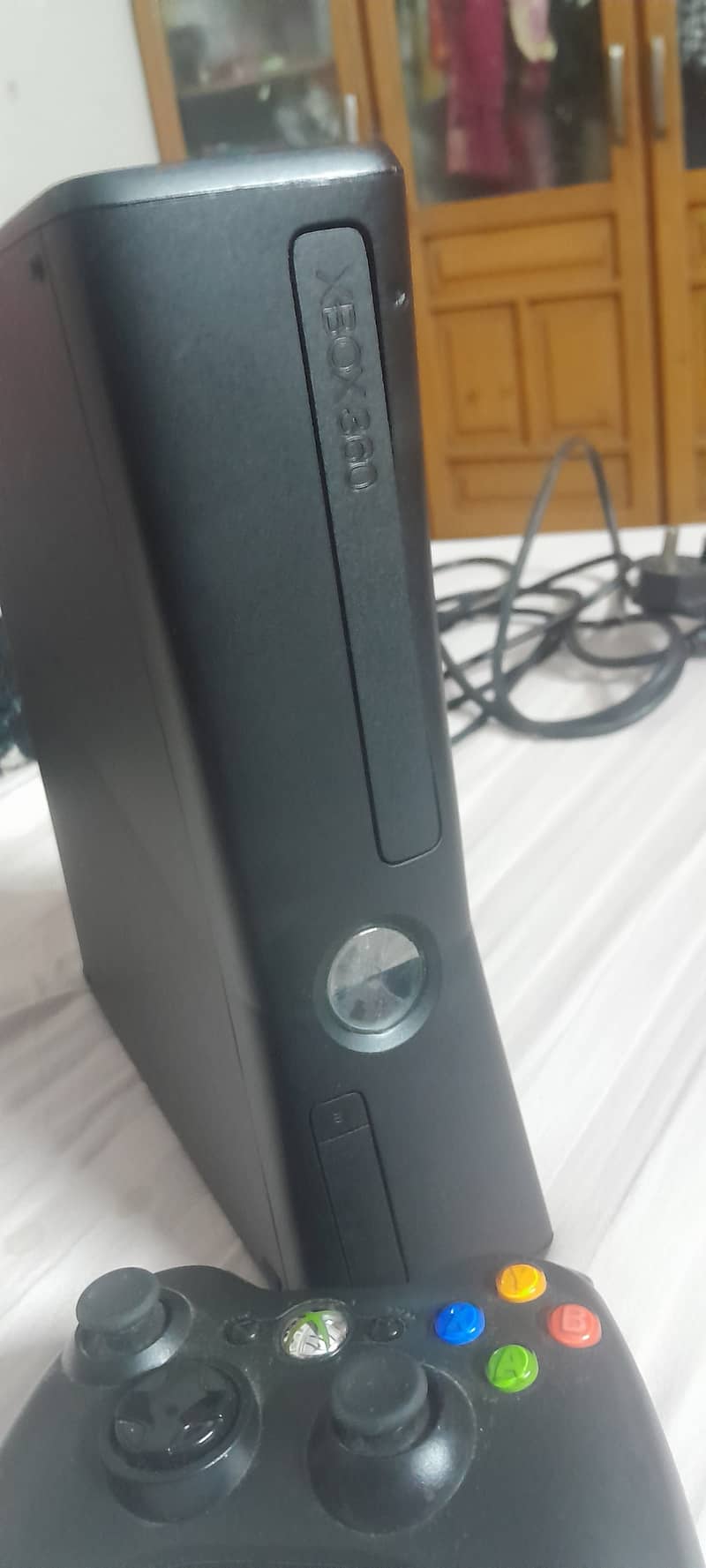 Xbox 360 with one wireless controller. New Condition less than  month 6