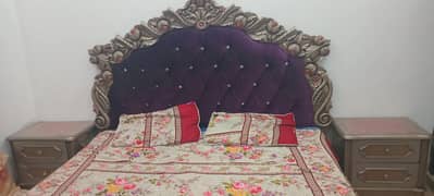 bed with dressing table and side tables