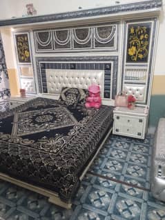 Bed with two side tables