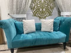 Green 2 seater sofa