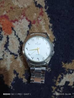 Watch silver color Arabic numbers