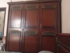 Wooden three door wardrobe
