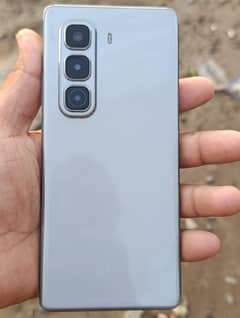 Infinix hot 50 pro plus 10/10 condition ha 11 munth wrenty