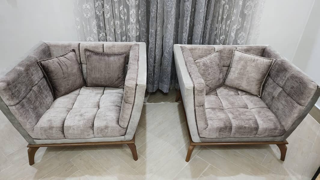 7 seater sofa set with center table and 2 side tables . 1