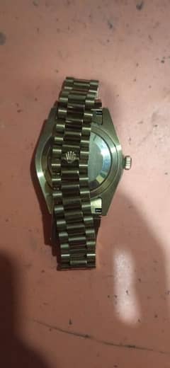 Rolex watch oyster perpetual day and date first edition