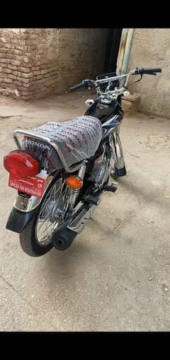 honda 125  with paper