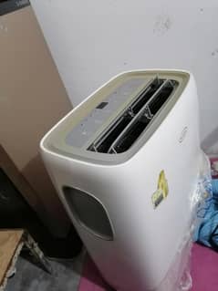 imported portable ac with full accessories pipe hose and everything