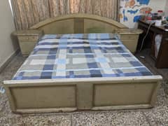 Double bed with two side tables without mattress