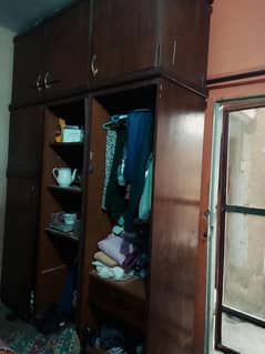 three door cupboard with store