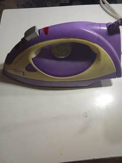 Dry + steam iron for sale