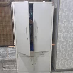 wardrobe with 4 sections and two drawer. . . hanging side separate. .