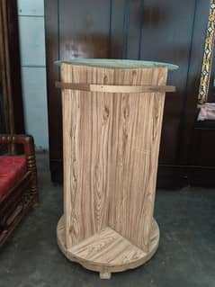 Towel rack and cream tables