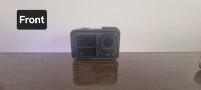 Dji osmo 4 action barely used action camera. Sd card included. Box not