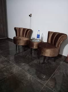 Two small sized cushioned sofas for sale