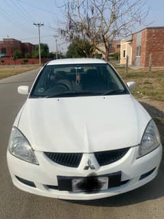 Mitsubishi Lancer GL Manual In Original Condition.