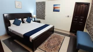 Double bed with mattress and side tables
