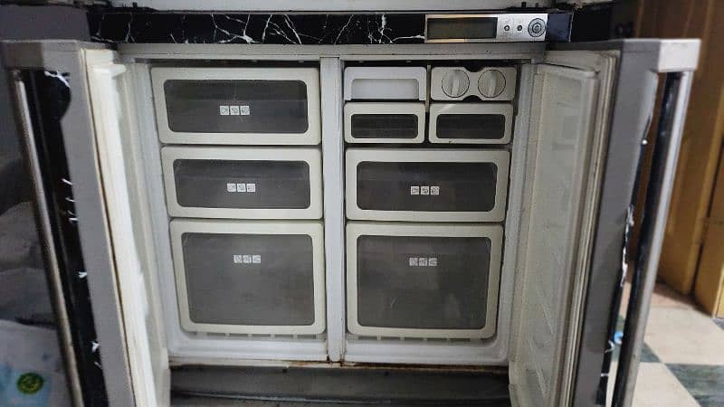 Sharp 4-Door Refrigerator – Excellent Condition, Energy Efficient 1