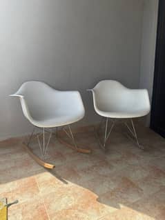 Pair of Stylish White Rocking Chairs