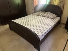 Dark brown bed set with mirror dresser