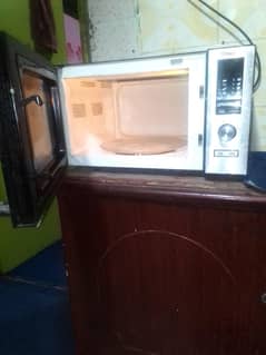 Dawlance microwave oven sale on urgent basis 03158334140.